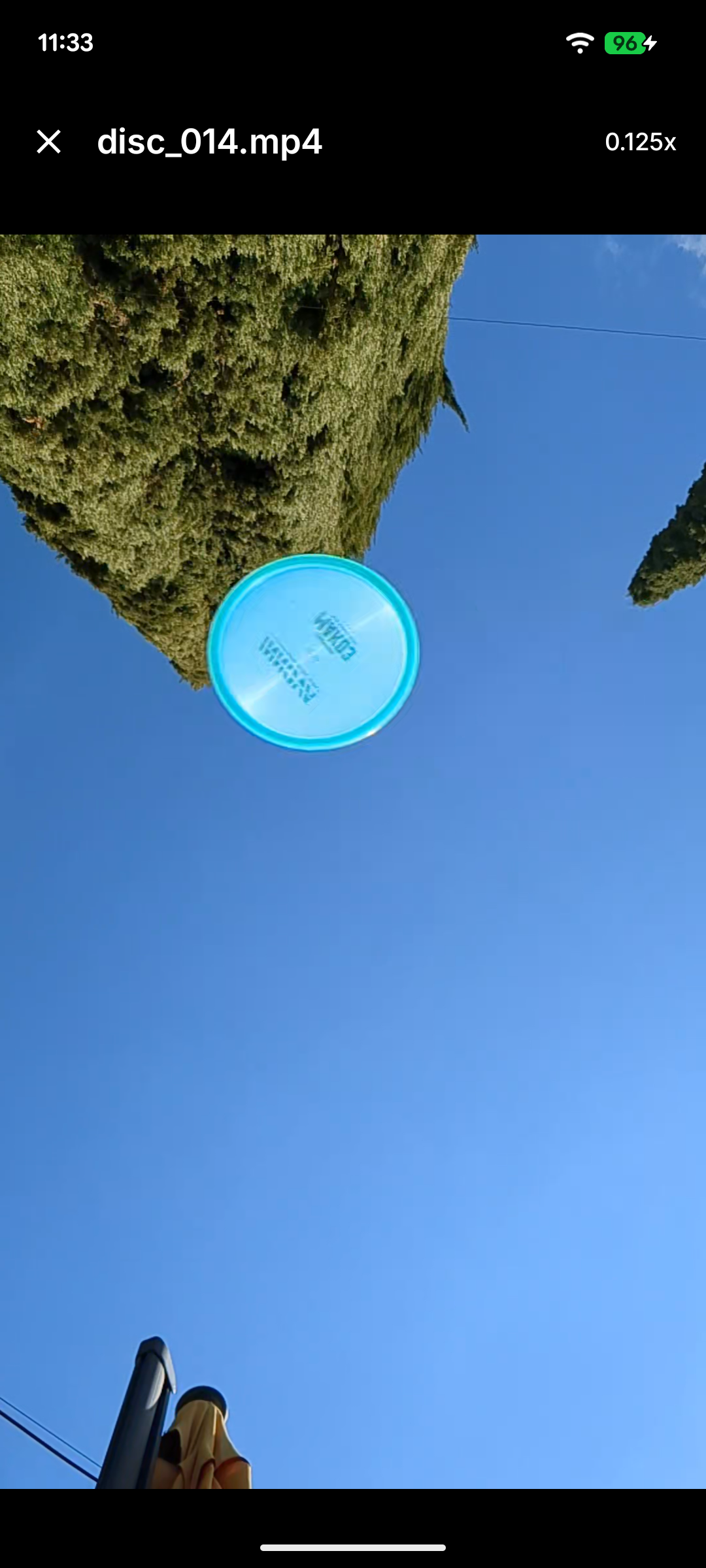 Video screen showing slow motion disc flight capture